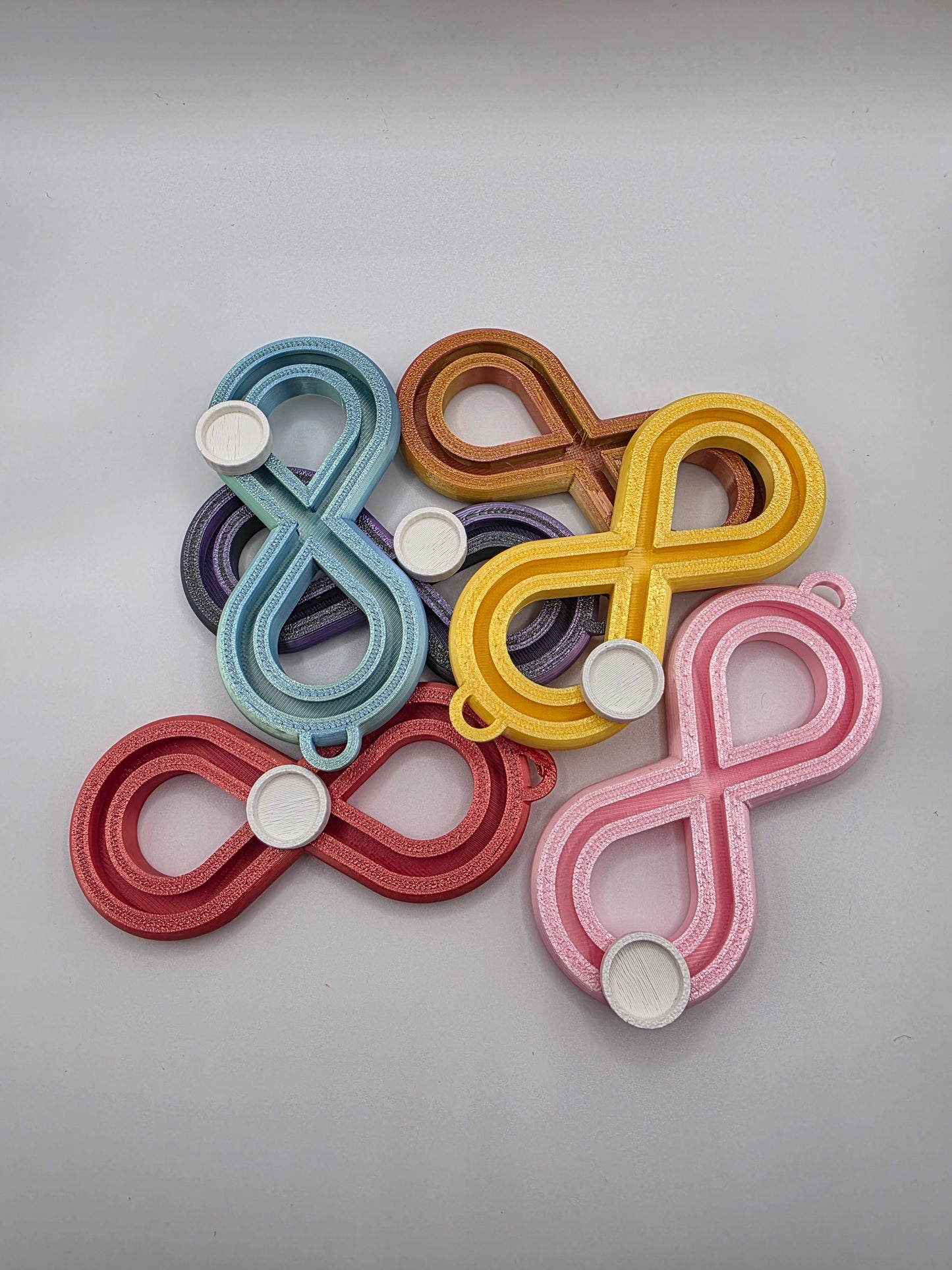 3dFidgets - Infinite Breath a soothing, figure-eight fidget tool designed to help you slow down, regulate your breathing, and find calm anytime, anywhere