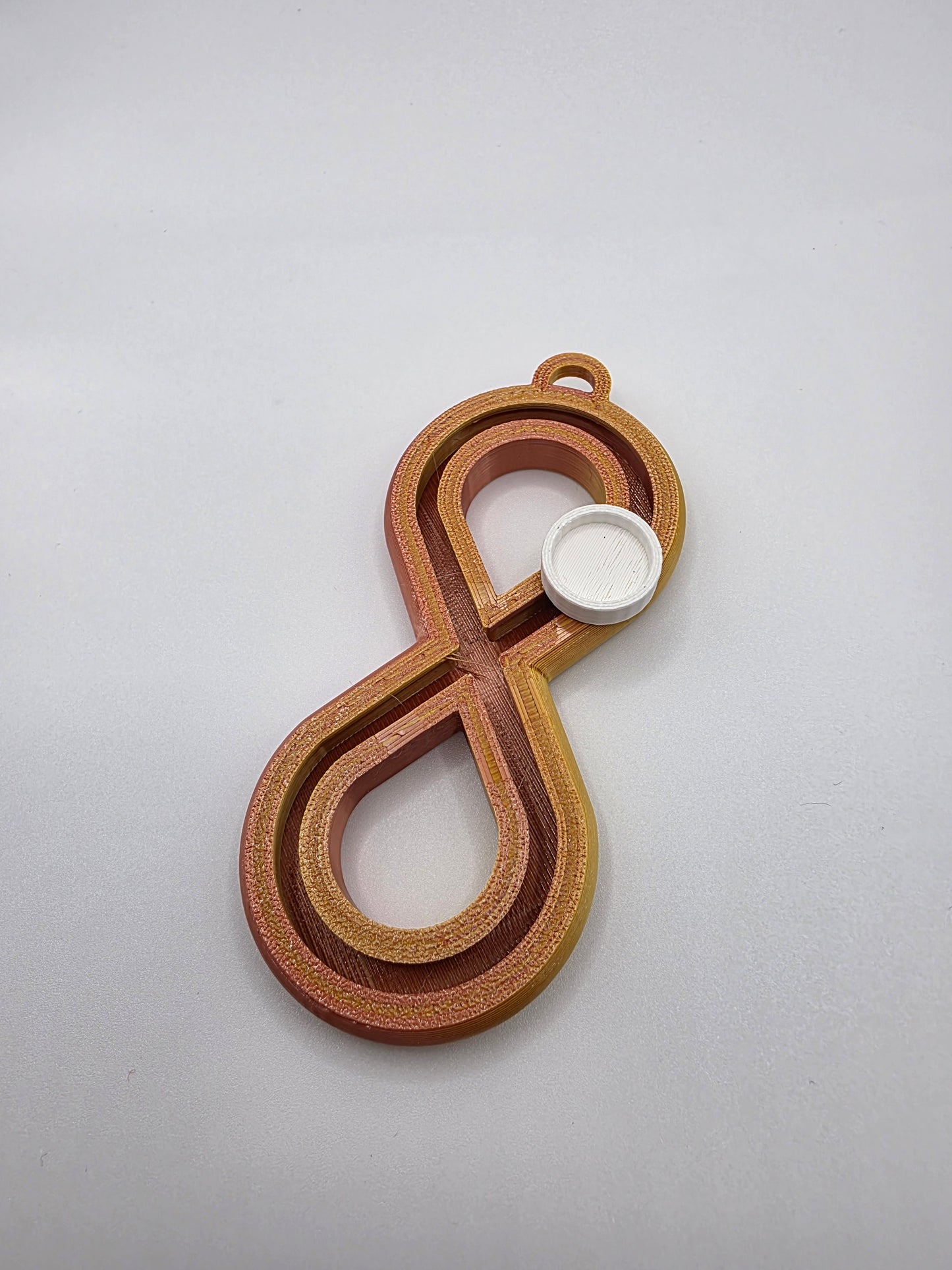 3dFidgets - Infinite Breath a soothing, figure-eight fidget tool designed to help you slow down, regulate your breathing, and find calm anytime, anywhere