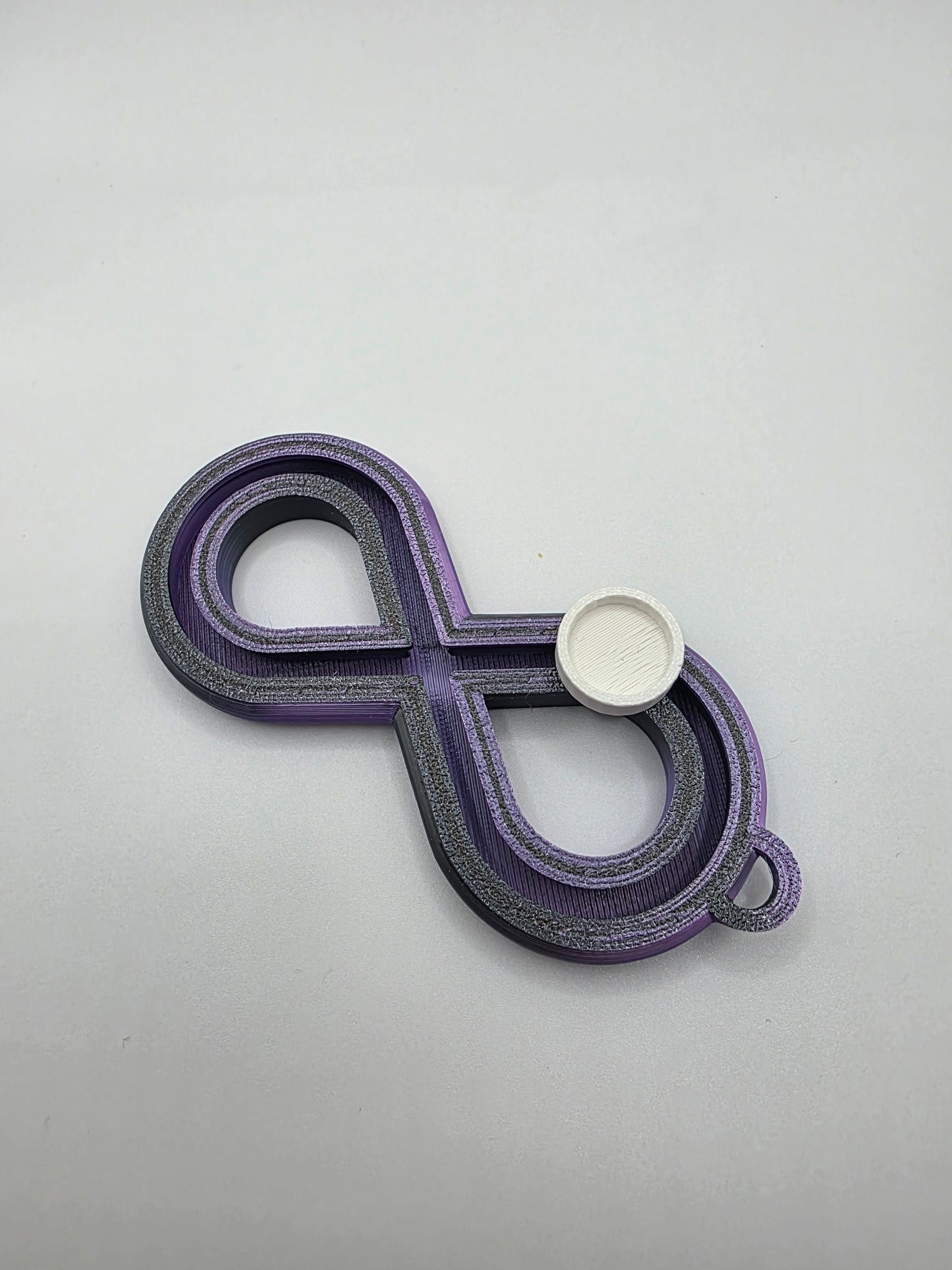 3dFidgets - Infinite Breath a soothing, figure-eight fidget tool designed to help you slow down, regulate your breathing, and find calm anytime, anywhere