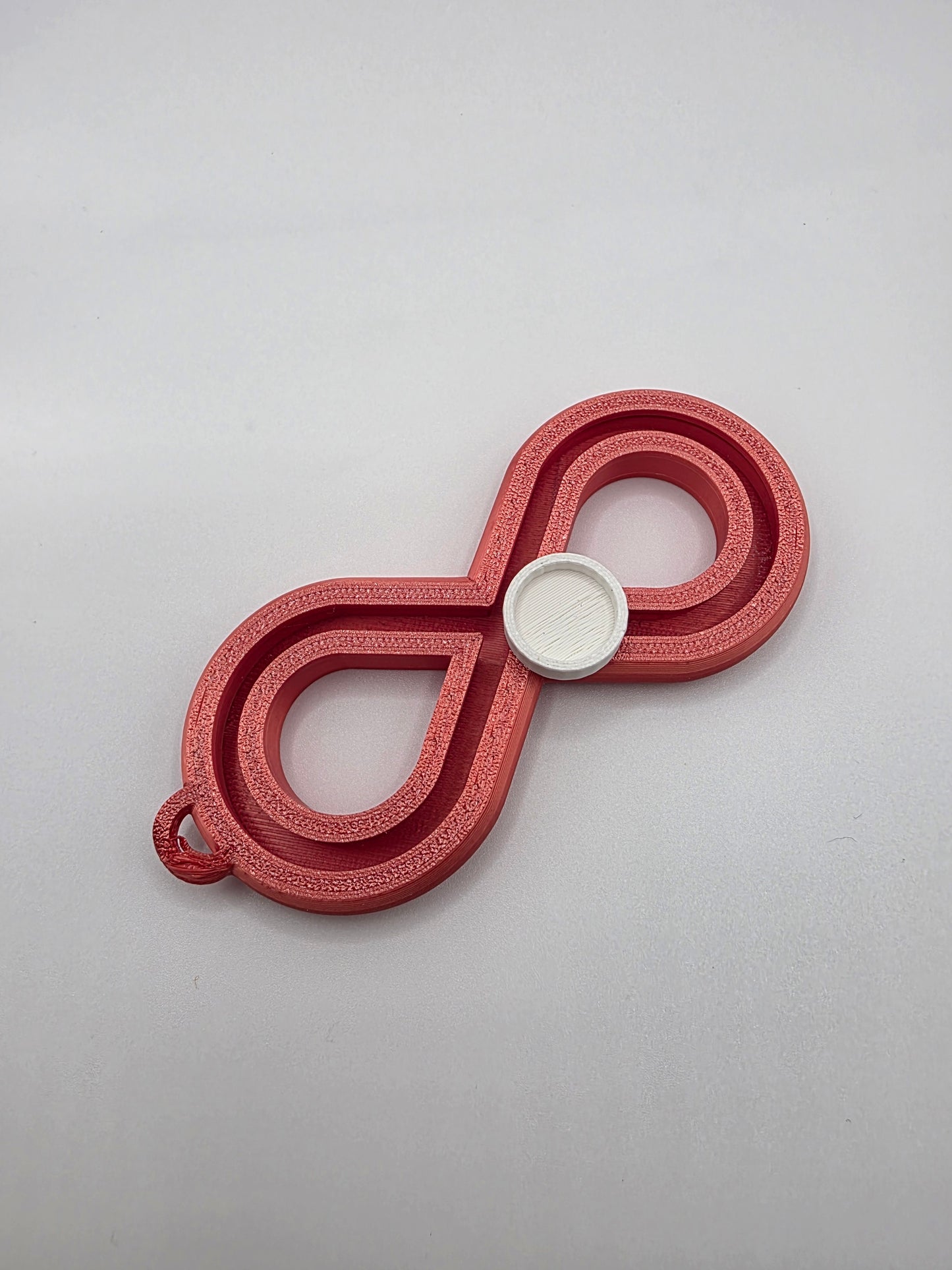 3dFidgets - Infinite Breath a soothing, figure-eight fidget tool designed to help you slow down, regulate your breathing, and find calm anytime, anywhere