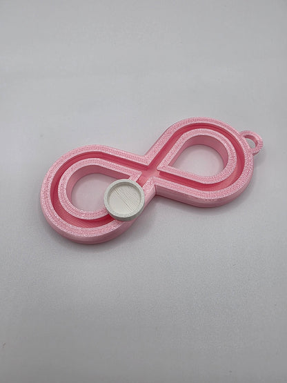3dFidgets - Infinite Breath a soothing, figure-eight fidget tool designed to help you slow down, regulate your breathing, and find calm anytime, anywhere