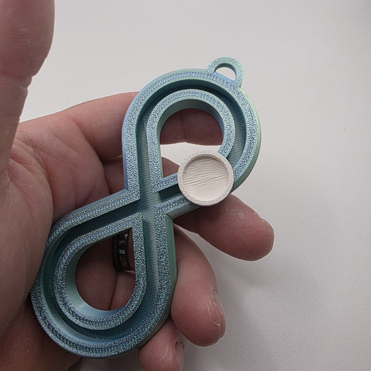 3dFidgets - Infinite Breath a soothing, figure-eight fidget tool designed to help you slow down, regulate your breathing, and find calm anytime, anywhere