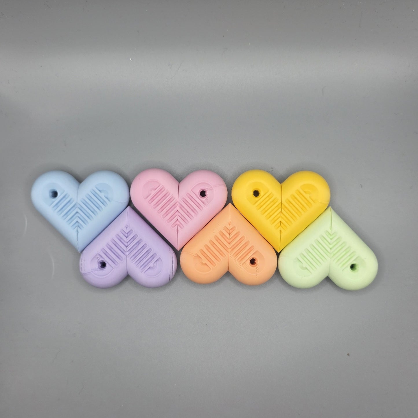 sensit heartSnap - Magnetic snap finger toy in heart shape with textured inside perfect for ADHD, autism and neurodivergent people