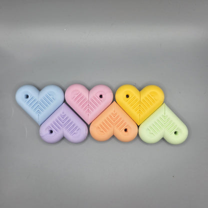 sensit heartSnap - Magnetic snap finger toy in heart shape with textured inside perfect for ADHD, autism and neurodivergent people