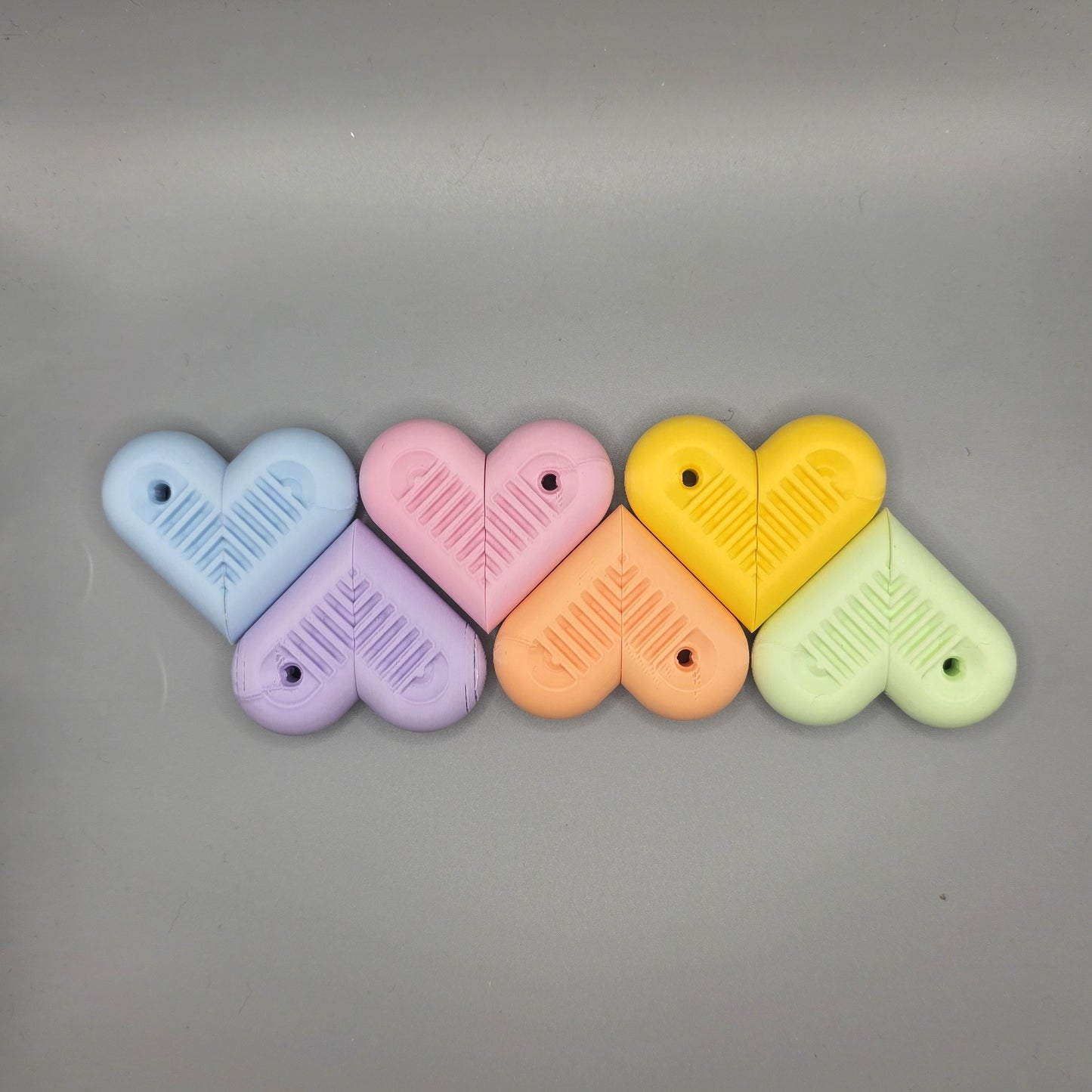 sensit heartSnap - Magnetic snap finger toy in heart shape with textured inside perfect for ADHD, autism and neurodivergent people
