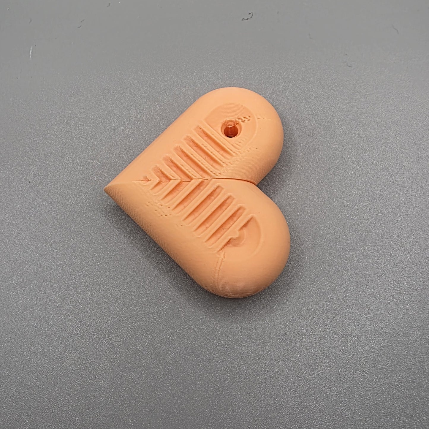 sensit heartSnap - Magnetic snap finger toy in heart shape with textured inside perfect for ADHD, autism and neurodivergent people