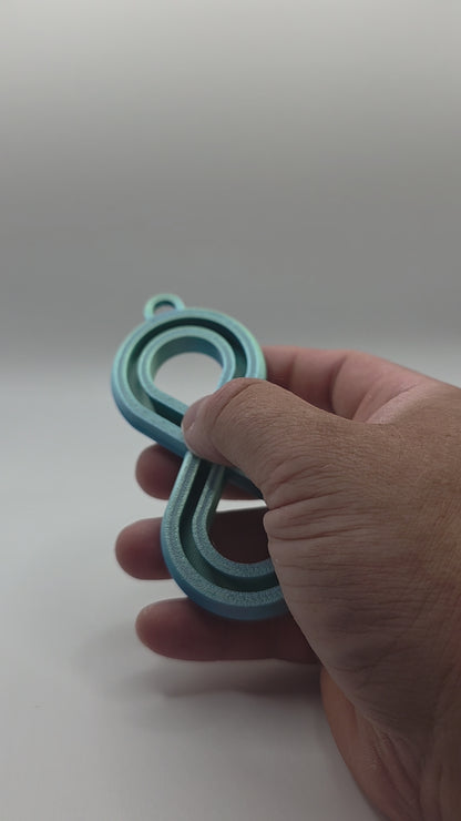 3dFidgets - Infinite Breath a soothing, figure-eight fidget tool designed to help you slow down, regulate your breathing, and find calm anytime, anywhere