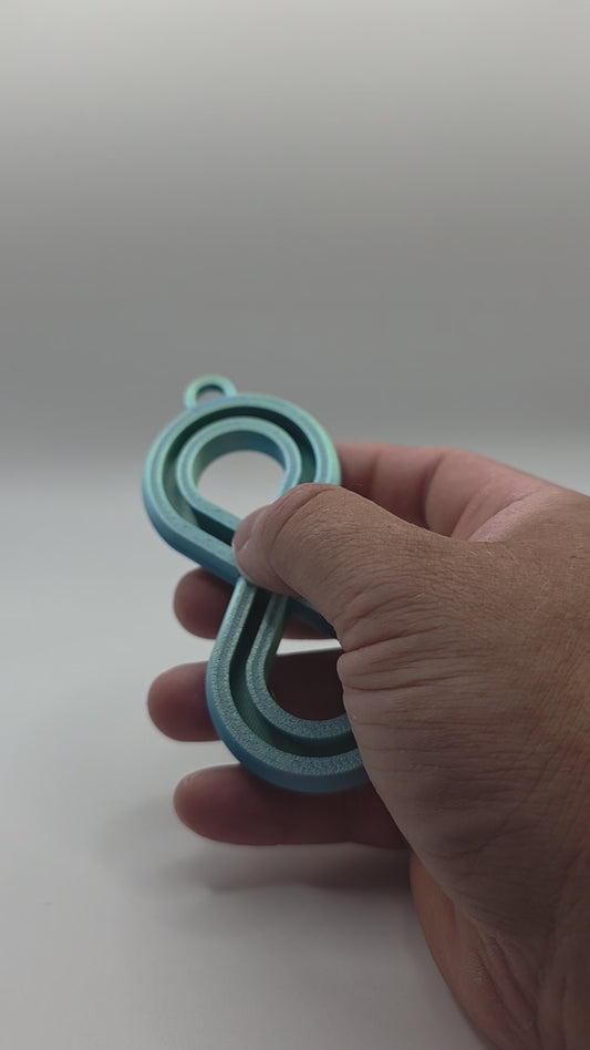 3dFidgets - Infinite Breath a soothing, figure-eight fidget tool designed to help you slow down, regulate your breathing, and find calm anytime, anywhere